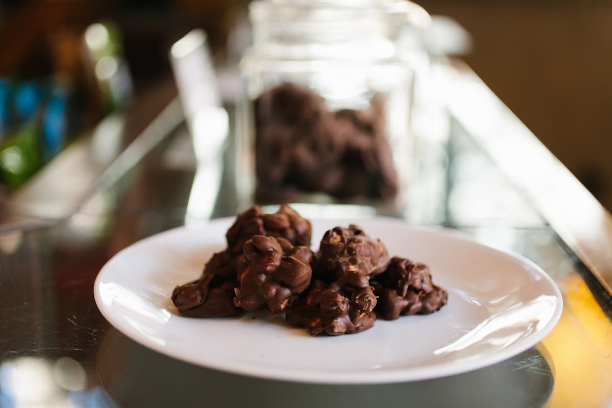 Chocolate-covered peanut clusters are delicious protein-packed treats that are a hit with grown-up and kids alike.