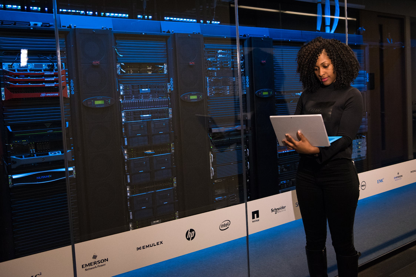 A woman on a laptop outside of the data centre