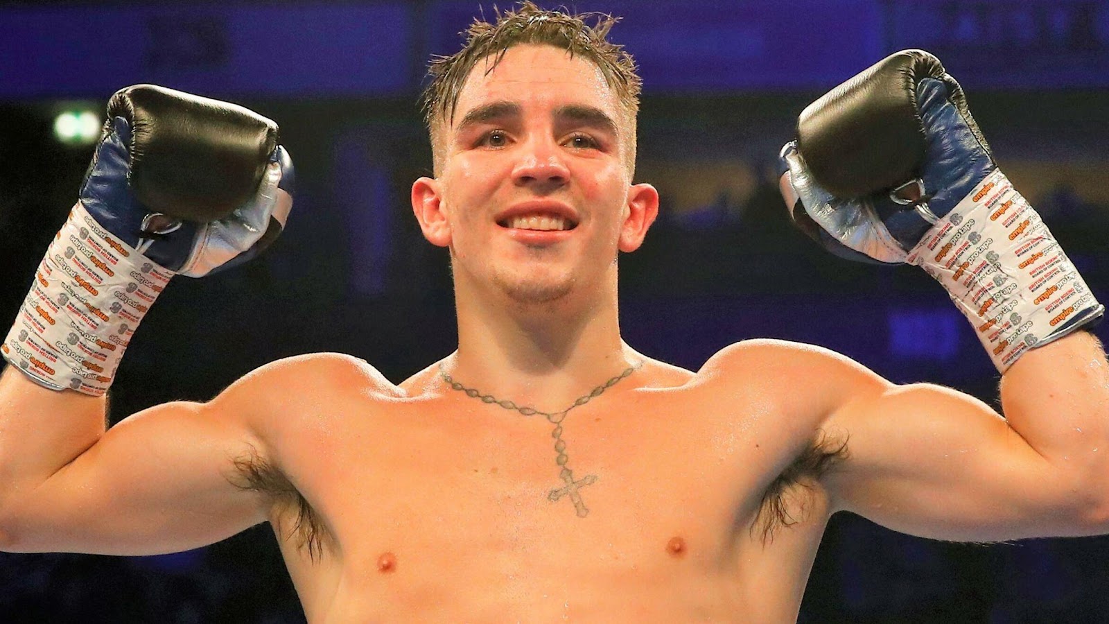 A person wearing boxing gloves

Description automatically generated with medium confidence