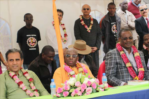 ISCKOM Temple Kampala chairman Mukesh Shukla, Swami Bhakti Narasimha from South Africa and Nairobi Governor Dr Evans Kidero.