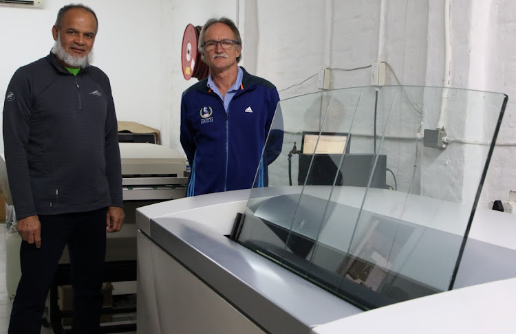 Iqbal Sain, left, and his partner Alan Taylor at Bukani Print in Swartkops Street, North End