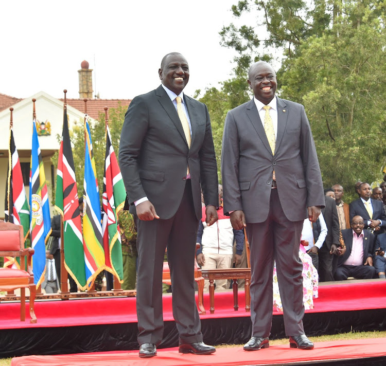President William Ruto and Deputy President Rigathi Gachagua smile