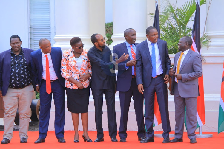 Governors Abdi Hassan Guyo (Isiolo), Kawira Mwangaza (Meru), Ole Lenku (Kajiado) and others, interact at State House during the flagging off of relief food to drought-stricken counties on September 26,2022.