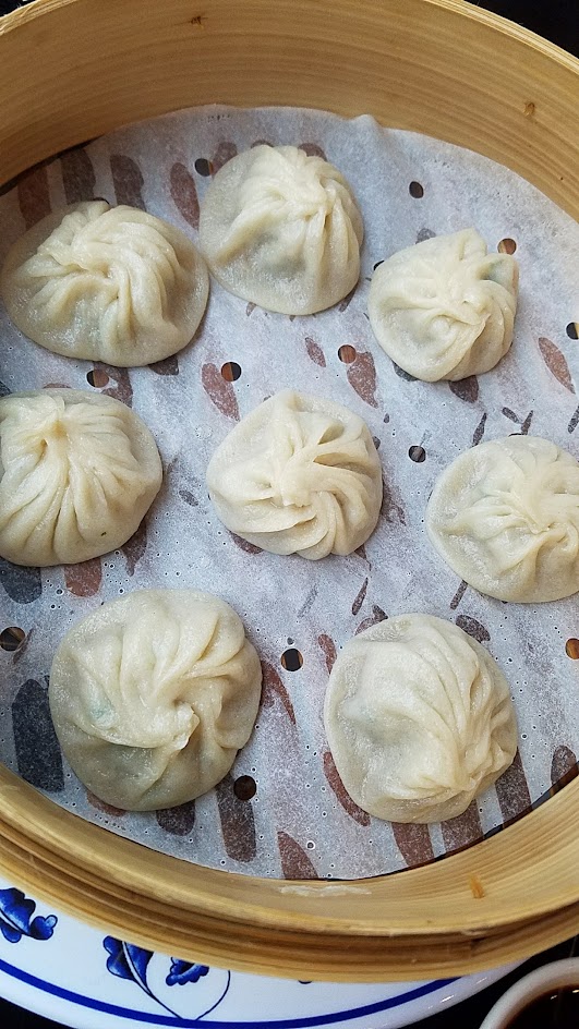 At XLB in Portland, Xiao Long Bao, the Shanghai Soup Dumplings with seasoned pork filling with ginger and garlic mixed with pork stock that is wrapped in dough