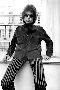 Bob Dylan posing at a press conference at The Savoy. 