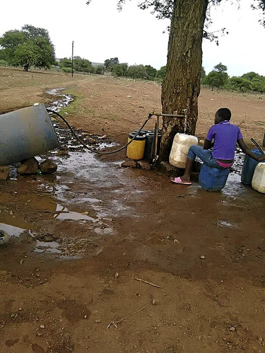 A Dludluma resident at a communal tap. Residents blocked the IEC from voter registration at the weekend due to a lack of service delivery.