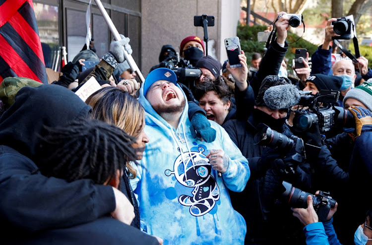 Damik Wright, brother of Daunte Wright, reacts to the outcome in the manslaughter trial of Kimberly Potter, the former Minnesota police officer who killed Black motorist Daunte Wright after mistaking her handgun for her Taser during a traffic stop, outside the Hennepin County Courthouse in Minneapolis, Minnesota, U.S. December 23, 2021.