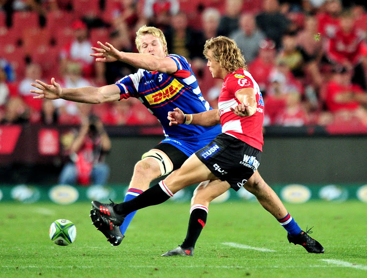 Andries Coetzee of the Lions challenged by Pieter-Steph Du Toit of the Stormers during 2018 Super Rugby match between Lions and Stomers at the Ellis Park Stadium, Johannesburg on 07 April 2018.