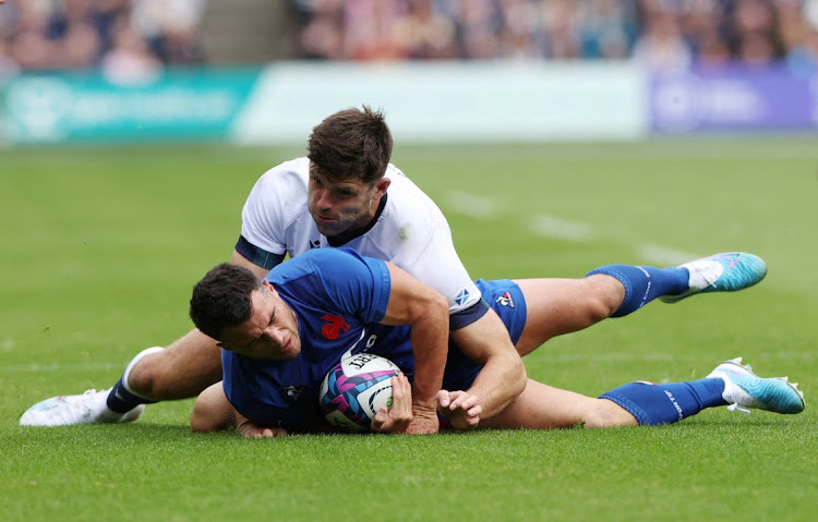 Scotland's Blair Kinghorn in action with France's Brice Dulin at Murrayfield Stadium in Edinburgh, Scotland, Britain, August 5 2023. Picture: RUSSELL CHEYNE/ACTION IMAGES/REUTERS