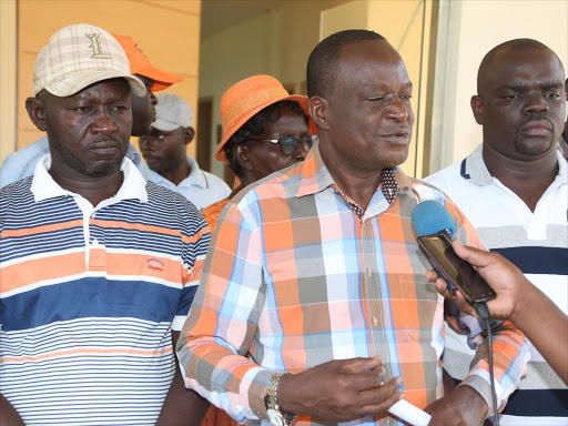 Nyando MP Fred Outa accompanied by other leaders addresses the press in Kisumu. They want President Uhuru Kenyatta to intervene over the Standoff of the Sh4.2billion Lake Basin Mall./MAURICE ALAL