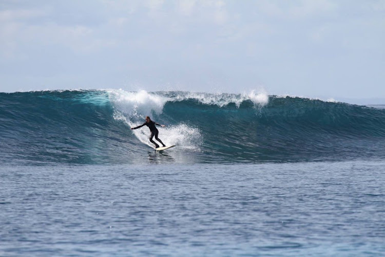 Niki Stilwell surfing in Indonesia