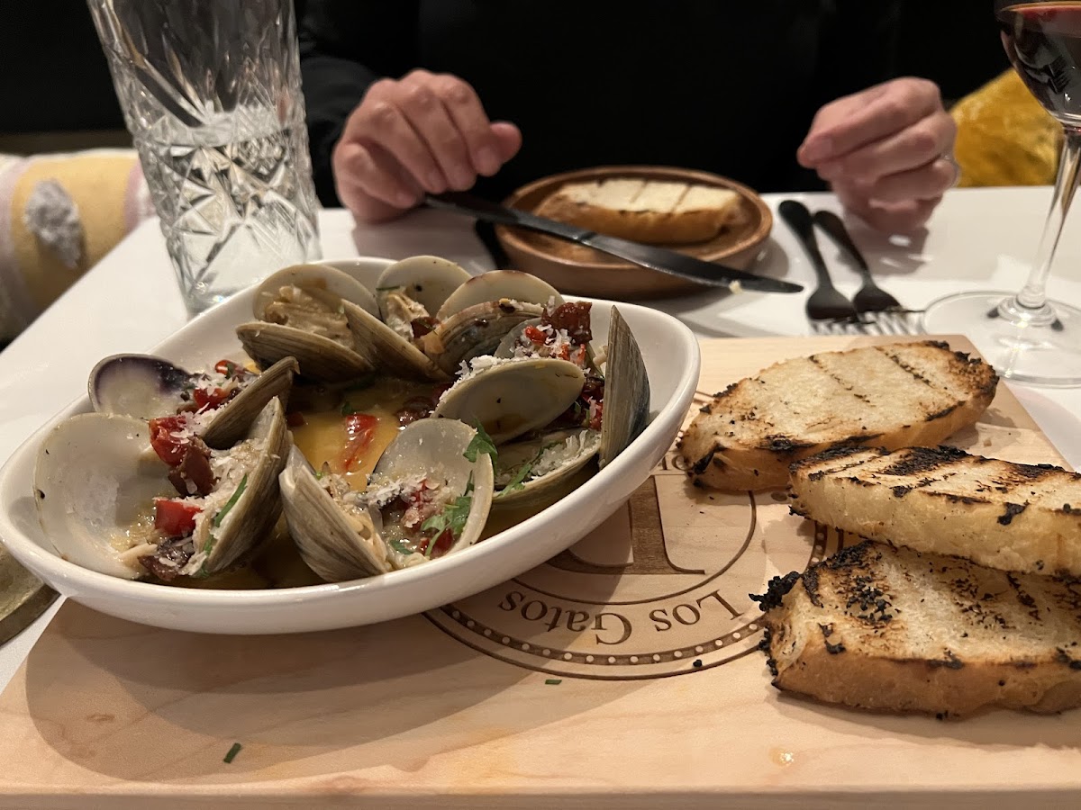 Clams as a starter. Great to be able to dip bread I to the broth and the bacon bits were a welcome touch.