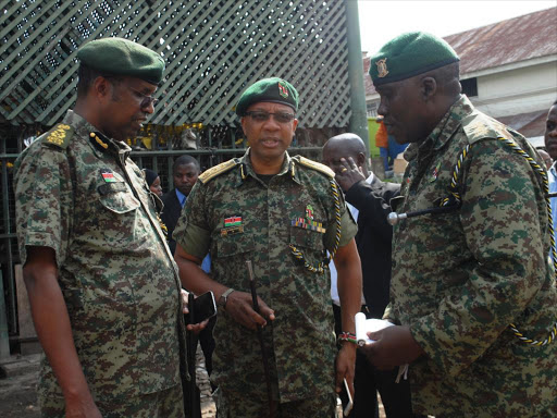 Former NYS deputy director general Adan Harakhe, Former NYS Director General Dr. Nelson Githinji and National Youth service Sector Commander Mombasa County Christoper Mulei during the launch of the NYS Youth Empowerment Programme in Mombasa on September 1,2015. Photo File