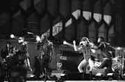 IN ACTION: American singer R Kelly (above) performs during the opening ceremony before a soccer match between Bafana Bafana and Mexico at Soccer City Stadium. Hip-hop legend Akon (top, left) poses with Zakumi. The Senegalese-American R&B singer, songwriter and record producer performed at GrandWest Casino in Cape Town. Black Eyed Peas (left) at the opening concert held in Soweto. PHOTOS: BRAM LAMMERS, ESA ALEXANDER AND ALON SKUY. 10/06/2010. © The Times.
BLACK EYED PEASThe opening concert, held in Soweto. There has been a tremendous atmosphere surrounding one of the biggest supporting event in the world. Fans coming together at the concert.10/6/10. PHOTOGRAPH: ALON SKUY