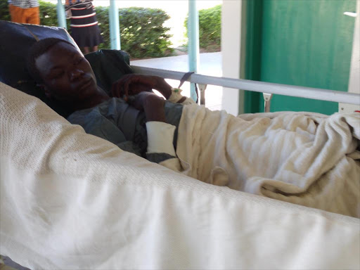 Twenty year old Lothur Ekitara at Samburu county referral hospital. He was among a group of four herders who were grazing camels when they were ambushed by a group of armed cattle rustlers on Saturday evening. /Martin Rwamba