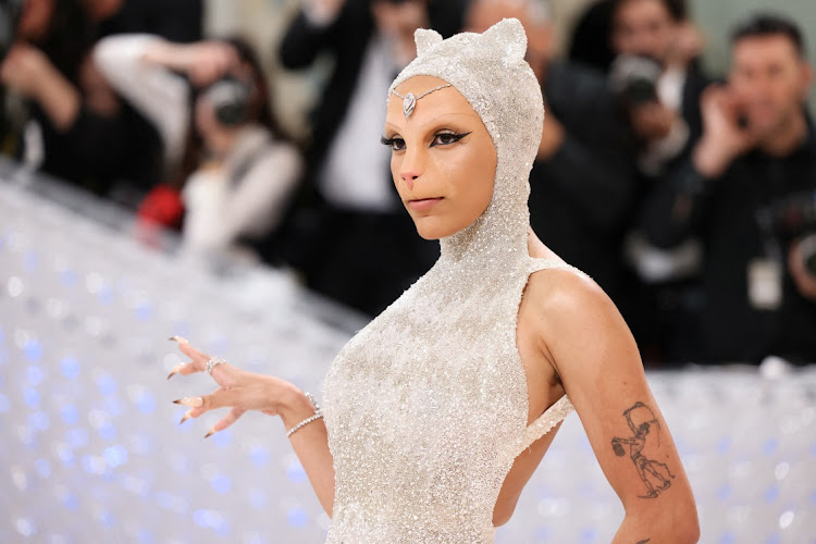 Doja Cat poses at the Met Gala, an annual fundraiser for the Metropolitan Museum of Art's Costume Institute. This year's theme was 'Karl Lagerfeld: A Line of Beauty'.