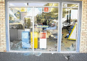 SHATTERED:  A  broken window and strewn debris are  evidence of a violent service delivery protest  in Zandspruit near Honeydew yesterday  where residents vandalised a Pep store.  PHOTO:  SIBUSISO MSIBI