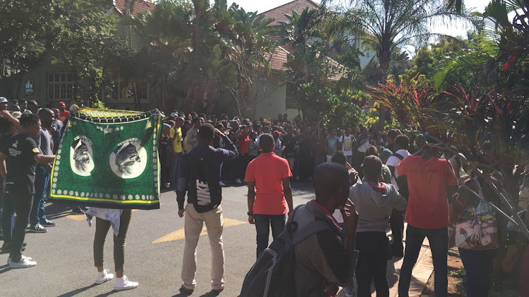 Protesting students gather at the Durban University of Technology's Steve Biko campus on Tuesday morning.