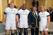 Allister Coetzee head Coach with Adriaan Strauss Captain and first caps Bongi Mbonambi and Faf de Klerk during the Team Photo at Cullinan Hotel, Cape Town on 10 June 2016. Picture credit: BackpagePix