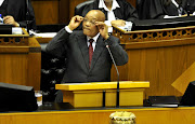 President Jacob Zuma answers questions in the National Assembly on August 6, 2015 in Parliament in Cape Town, South Africa.