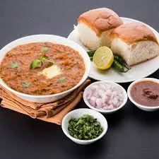 Pav Bhaji (2 Pcs Pav + Vegetable Curry, Lemon, Mint Chutney & Onion)