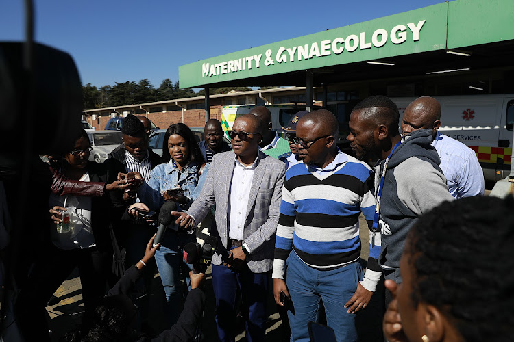 Gauteng MEC for health Dr Bandile Masuku addresses the media outside the maternity ward at Chris Hani Baragwanath Hospital in Soweto from which a newborn baby was abducted by a woman on Thursday afternoon. Gauteng police found the baby on Friday and arrested a 35-year-old suspect.