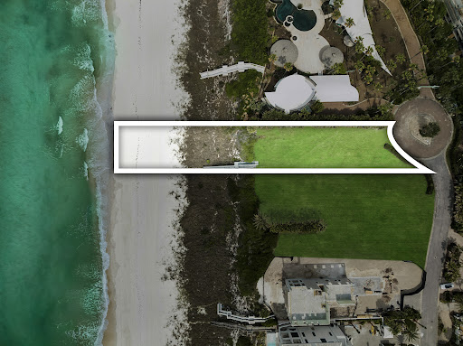 Aerial view beach, garden and pool in this luxury property for sale in Inlet Beach ($16,900,000 - 1,983 m²)