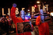 WikiLeaks founder Julian Assange's supporters demonstrate against U.S. extradition in front of the British Consulate in Barcelona, Spain February 20, 2024.  