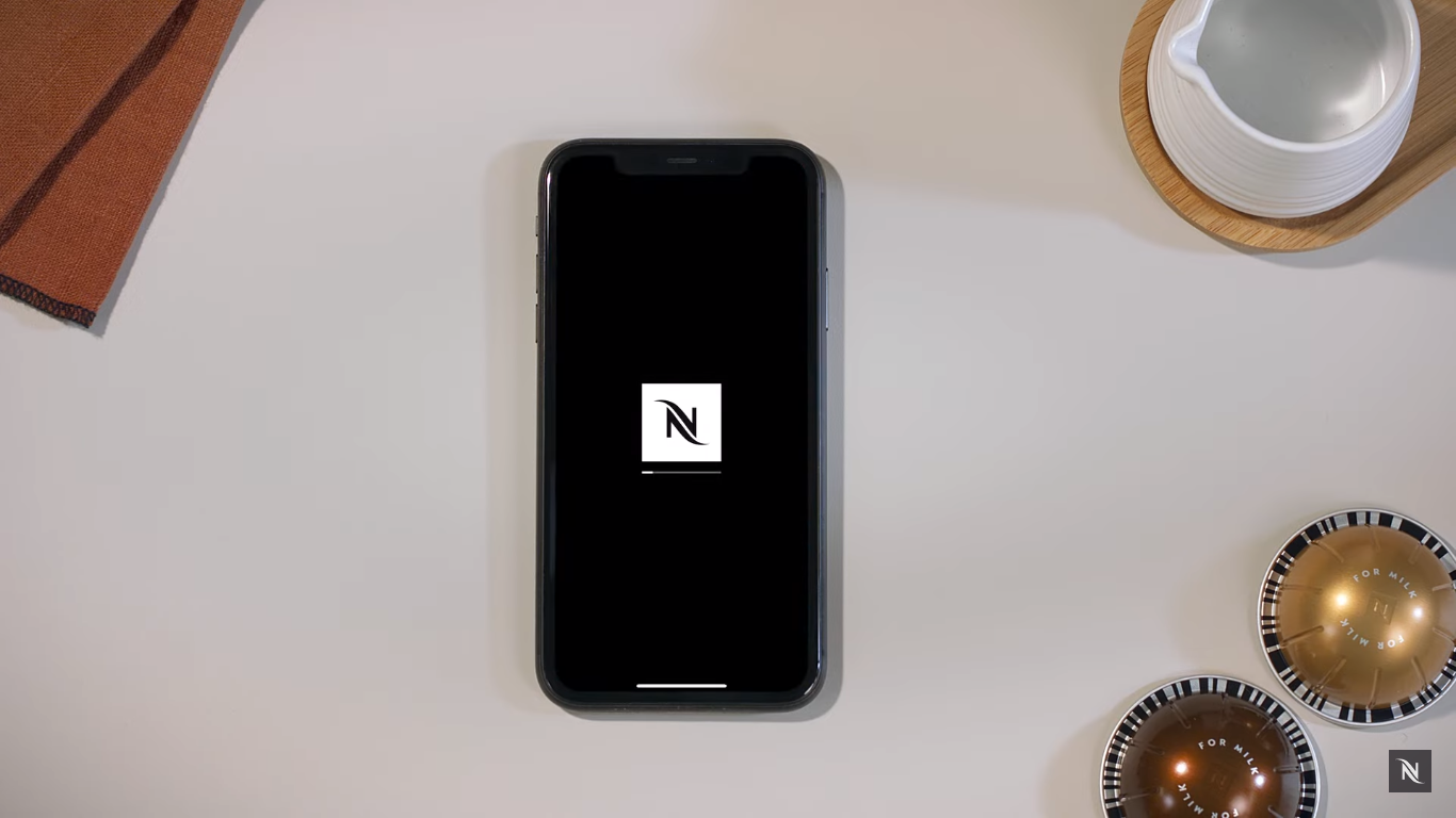 
This image provides instructions on "Updating the App to the Latest Version" for the Nespresso Vertuo Creatista Machine in our article titled "How to Connect Nespresso Vertuo Creatista to Wi-Fi and Bluetooth?"
