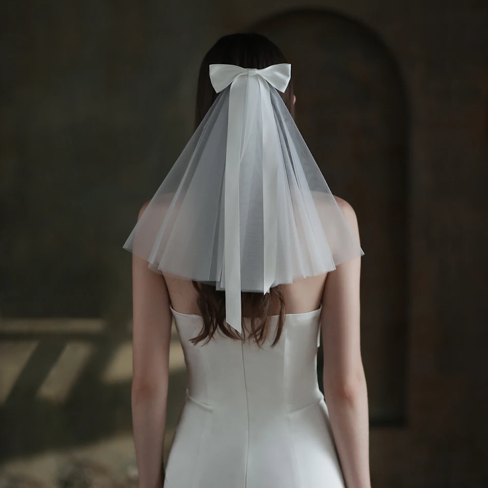 Grinalda de noiva com laço, Série Mori, para um visual romântico. Um acessório de cabelo de casamento perfeito para noivas que buscam charme.