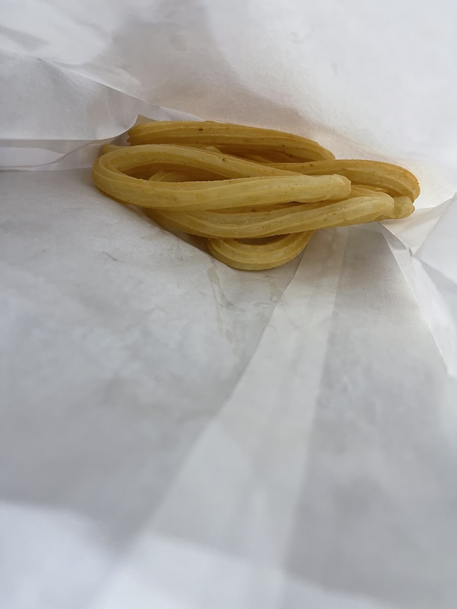 Plain gluten free churros. Given in a plain white bag.