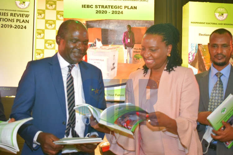 IEBC Chairperson Wafula Chebukati and Judiciary Chief Registrar Ann Amadi during the IEBC Strategic plan 2020-2024 launch at Bomas of Kenya on June 15, 2021.