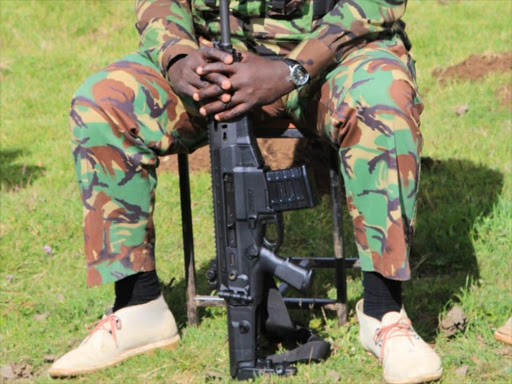 A police officer keeps vigil during security meeting to end hostilities on the Marakwet-West Pokot border on Wednesday August 1, 2018. /STEPHEN RUTTO