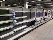 Shelves were empty in many stores this week as people rushed to buy food and supplies.