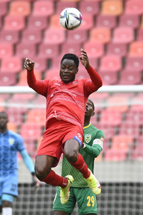 Eva Nga Bienvenu heads the ball in front of Nkosinathi Sibisi of Golden Arrows at the Nelson Mandela Bay Stadium in Gqeberha on Saturday