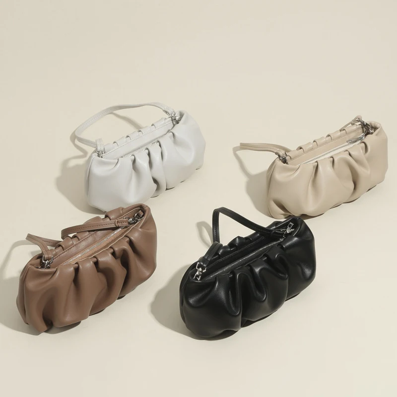 Sac à bandoulière unique en cuir véritable plissé couleur unie style dumpling, pour un look chic et pratique au quotidien.