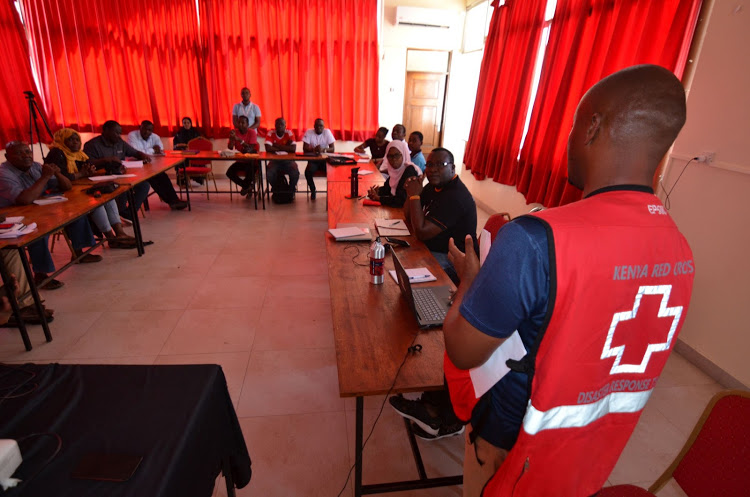 A Red Cross official talks to civil society members from Coast during Saturday's training on Covid-19 in Mombasa.