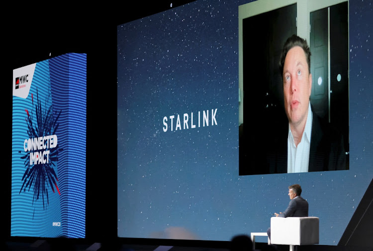 SpaceX founder and Tesla CEO Elon Musk speaks on a screen during the Mobile World Congress in Barcelona, Spain. File photo: REUTERS/NACHO DOCE