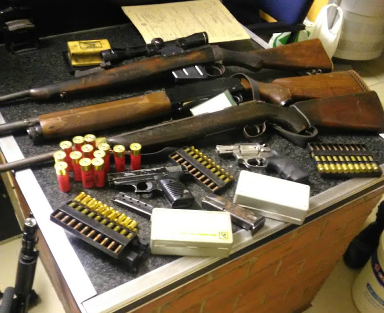 Some of the unlicensed firearms and ammunition seized by KZN police.