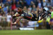 Stormers captain Siya Kolisi dives over to score the opening try during the Super Rugby match between DHL Stormers and Crusaders at DHL Newlands Stadium on May 18, 2019 in Cape Town, South Africa. 