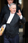 Advocate Barry Roux representing Oscar Pistorius leaves North Gauteng High Court on March 6, 2014 in Pretoria, South Africa. (Photo by Christopher Furlong/Getty Images)