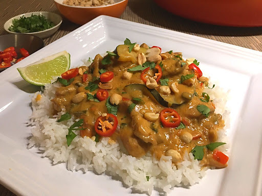 A delicious curry made with chicken thighs, vegetables and spices in a beautiful peanut sauce.