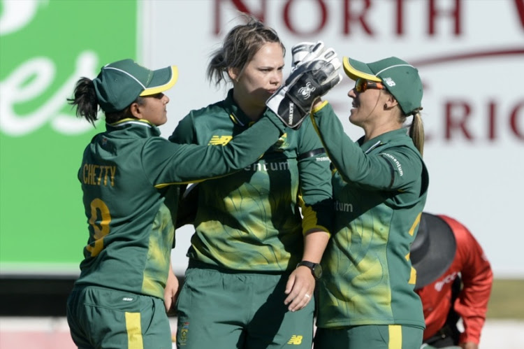 Trisha Chetty, Dane van Niekerk and Mignon du Preez of South Africa celebrate the wicket of Sanjida Islam of Bangladesh during 1st Womens ODI match between South Africa and Bangladesh at Senwes Park on May 04, 2018 in Potchefstroom, South Africa.