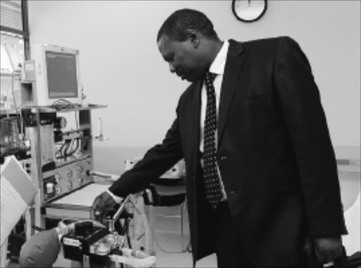 EXPLORING: KwaZulu-Natal premier Zweli Mkhize inspects intensive care unit equipment at Southbank Institute of Technology during his official visit to Queensland, Australia, yesterday.Pic: SIYABONGA MOSUNKUTU. 24/03/2010. © Sowetan.