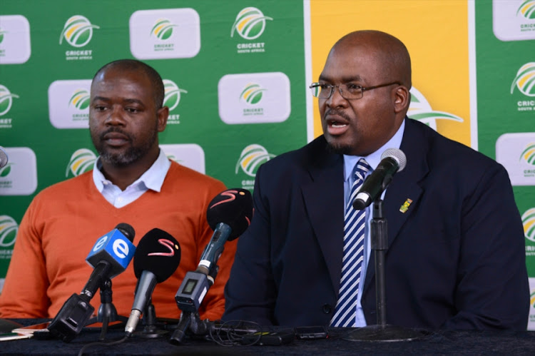 Suspended Cricket South Africa acting chief executive Thabang Moroe (L) alongside president Chris Nenzani.