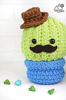 crochet cactus plushie on white background