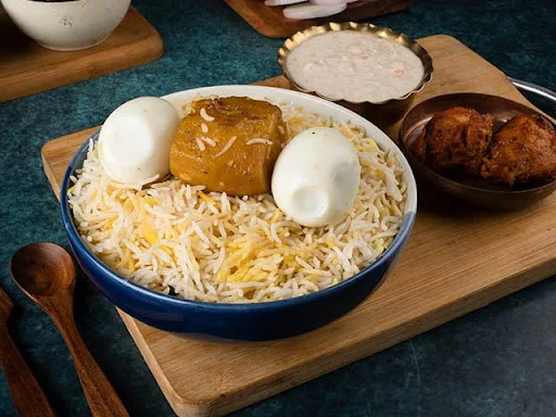 Egg Biryani With Raita + Tikka Kebab