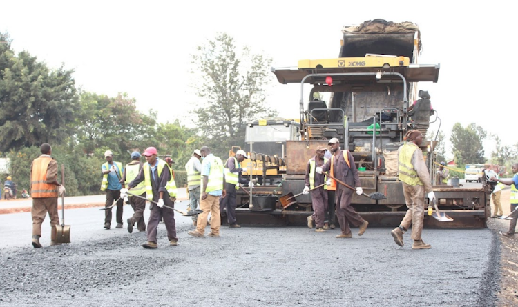 Construction workers working on the Kenol-Sagana-Marua dual carriageway