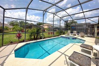 Private sun-drenched pool and spa deck at this Kissimmee vacation villa