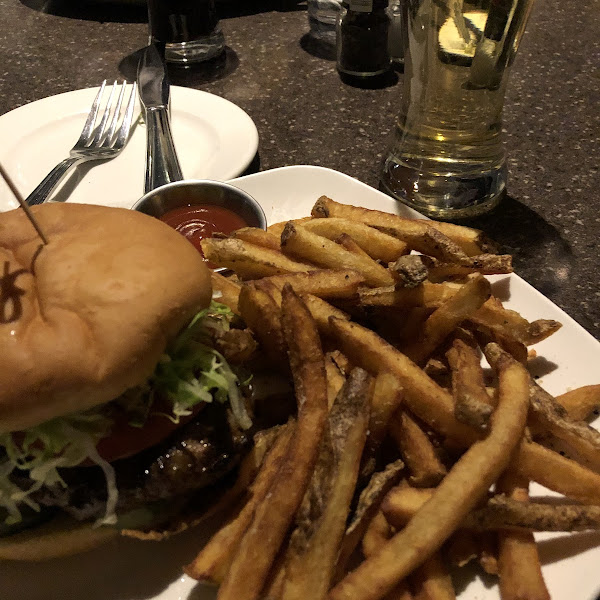 Gluten and dairy free hamburger and fries with bold rock cider on tap